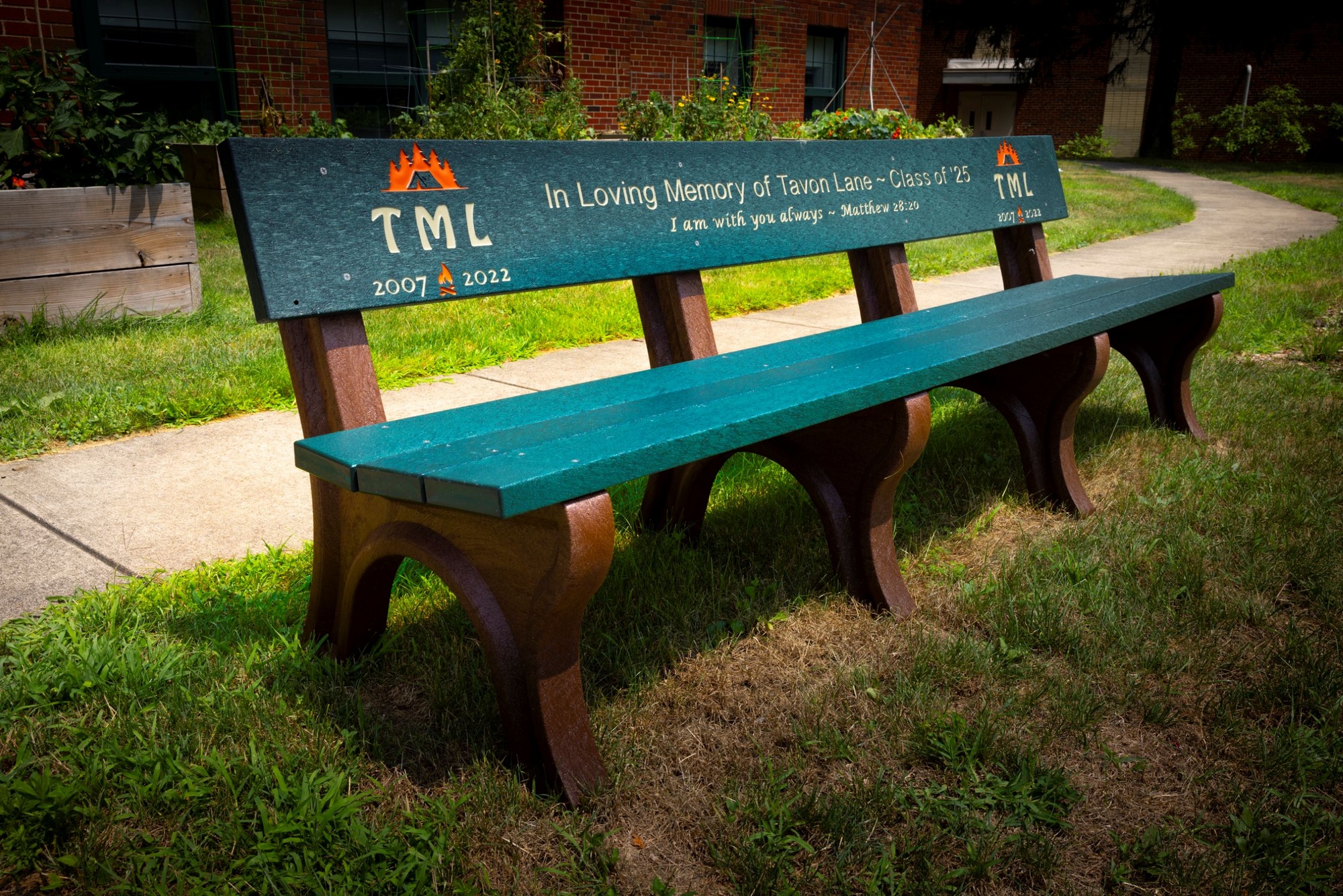green bench with TML logo green bench with TML logo