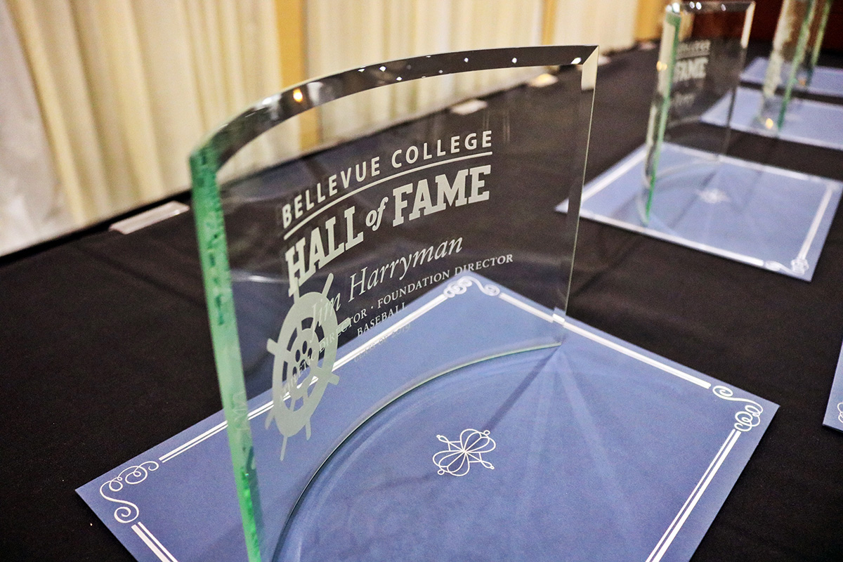 Bellevue College Hall of Fame glass plaque displayed on table, 